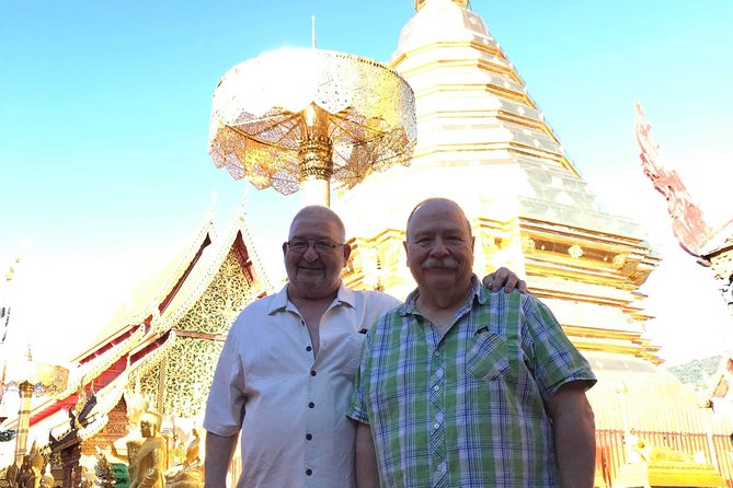 Alms and Wat Phra That Doi Suthep Private Chiang Mai Tour - Reaching Wat Phra That Doi Suthep above Chiang Mai