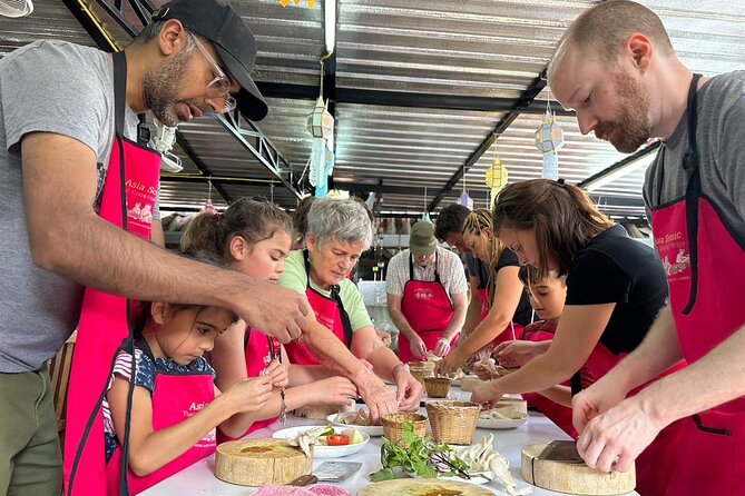 Authentic Thai Cooking Class and Farm Visit in Chiang Mai - Eating what you prepared in a bamboo hut