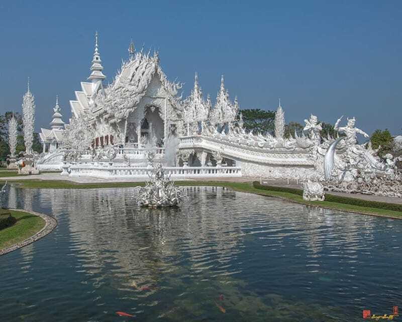 Chiang Mai: Chiang Rai White, Blue & Black Temples Day Tour - Wat Rong Suea Ten, a blue-and-gold change of mood