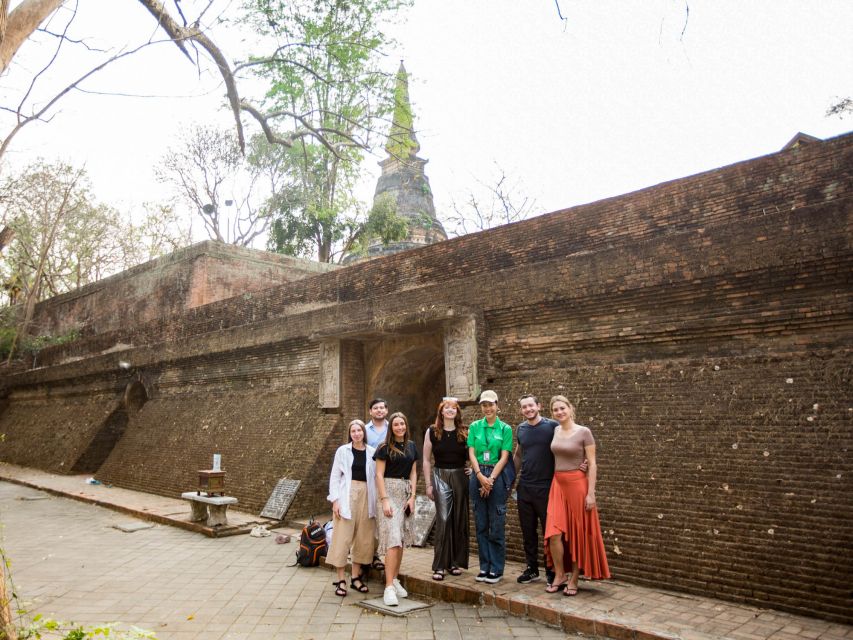 Chiang Mai: Doi Suthep and Wat Umong Enchanting Evening Tour - Chiang Mai glowing below the mountain