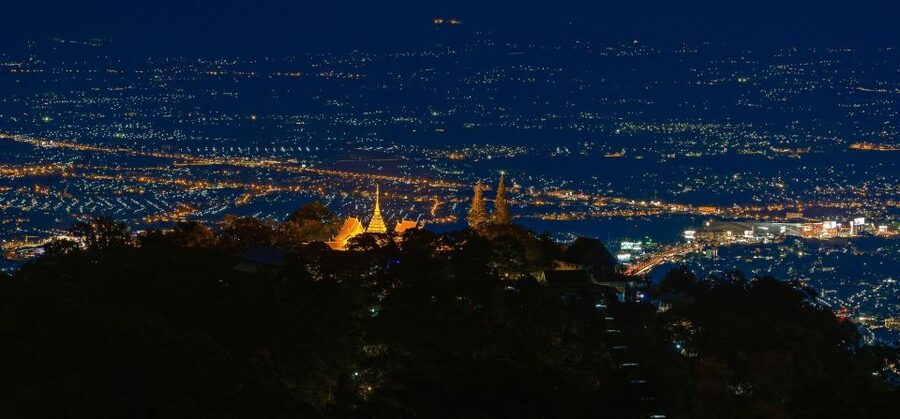 Chiang Mai: Doi Suthep & Wat Umong Twilight Tour with Pickup - The climb to Doi Suthep after sunset