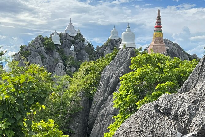 Chiang Mai Exotic Excursion Unseen Miracle of Faith To Pupadang Lampang Temple - Wat Chaloem Phra Kiat and the white pagodas above Lampang