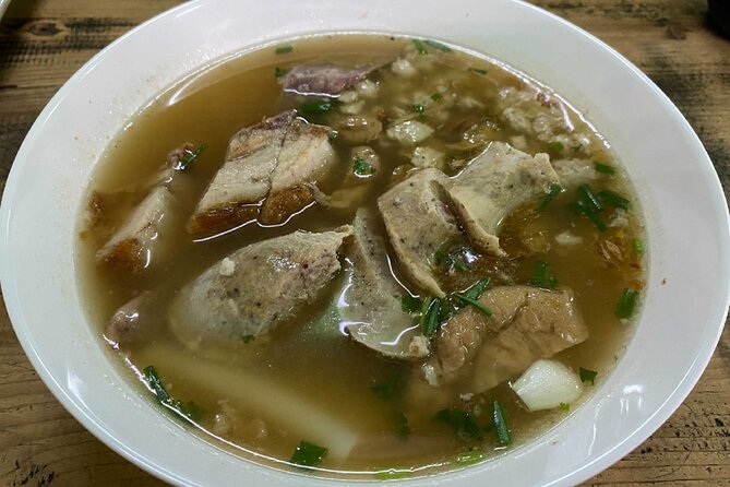 Chiang Mai Michelin Food Walking Tour with Professional Tour Guide - Thana Ocha’s Hakka-style noodle finish