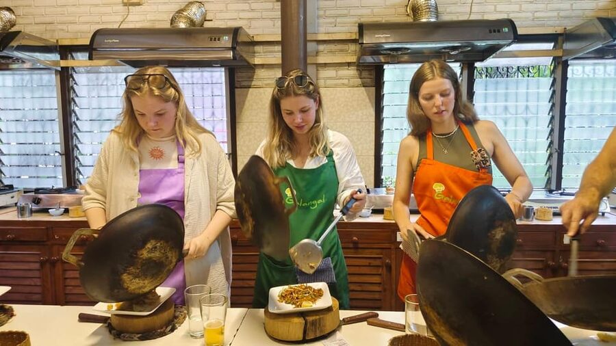 Chiang Mai: Morning Cooking Class with Market Visit - Picking herbs in the organic garden