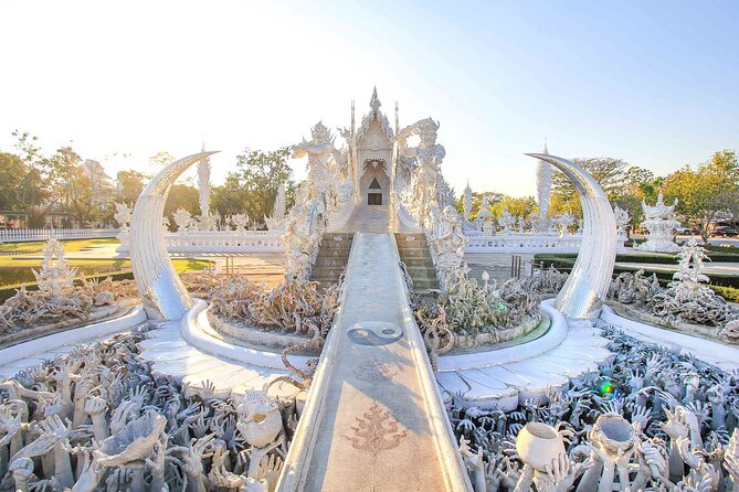 Chiang Rai Full Day Tour with Boat Trip and Longneck Village - Wat Rong Seur Ten, the Blue Temple