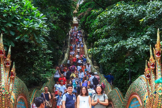 Doi Suthep and Hmong Hilltribe Half Day Tour in Chiang Mai - Climbing the 300-plus naga staircase