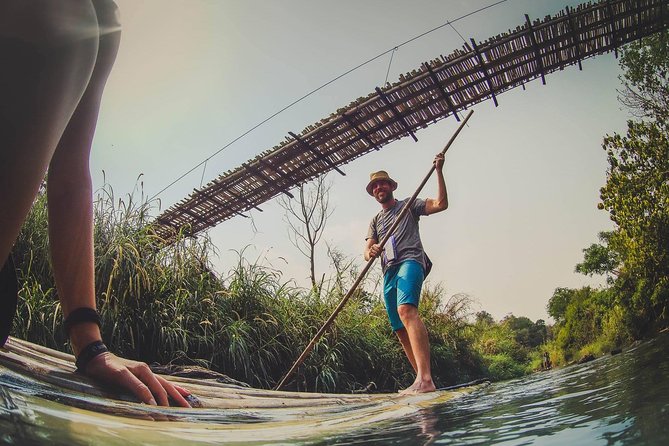 Elephant Sightings , Bamboo Rafting Through The Jungle, Swimming In a Waterfall - Steering a bamboo raft in Mae Wang National Park