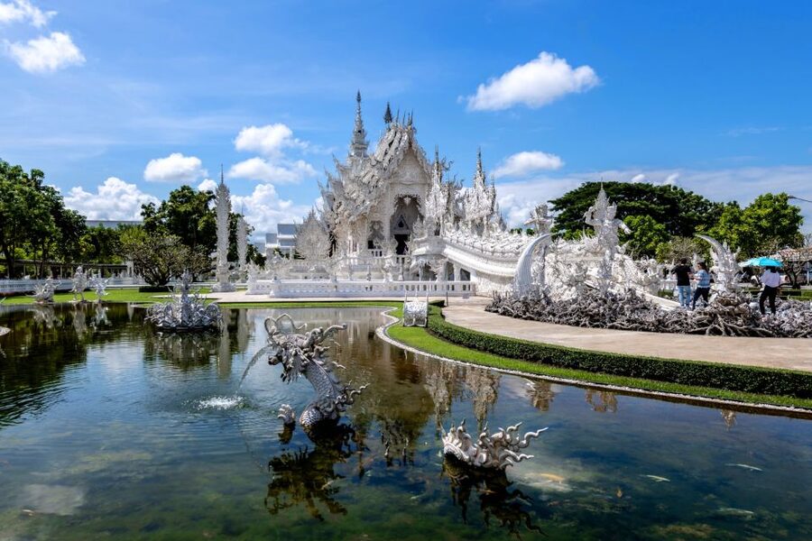 From Chiang Mai: Chiang Rai's Temples Exploration Day Trip - Entering the White Temple