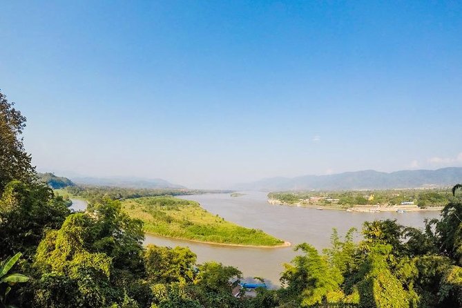 From Chiang Mai: White and Blue Temple & Golden Triangle Day Trip - A Mekong boat ride through Chiang Rai Province