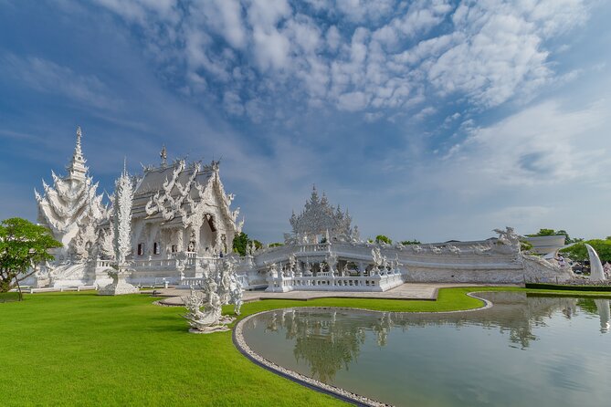 Full Day Chiang Rai 3 Temples White, Blue,Big Bhudha Temples - The optional Longneck Karen village stop
