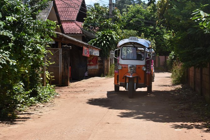 Full-Day Guided Tuk Tuk Chiang Mai Adventure and Rafting - Bamboo rafting as the quiet finish
