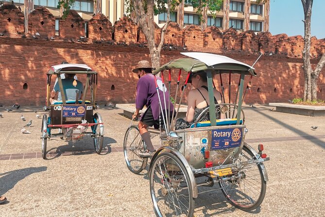 Half Day Private Chiang Mai Trishaw Ride and Mae Ping River Cruise - Walking through Warorot Market and its flower stalls
