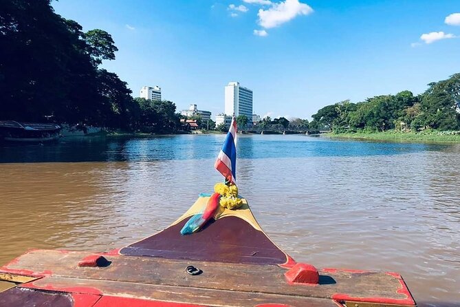 Half Day Private Chiang Mai Trishaw Ride and Mae Ping River Cruise - The guide and private-tour experience