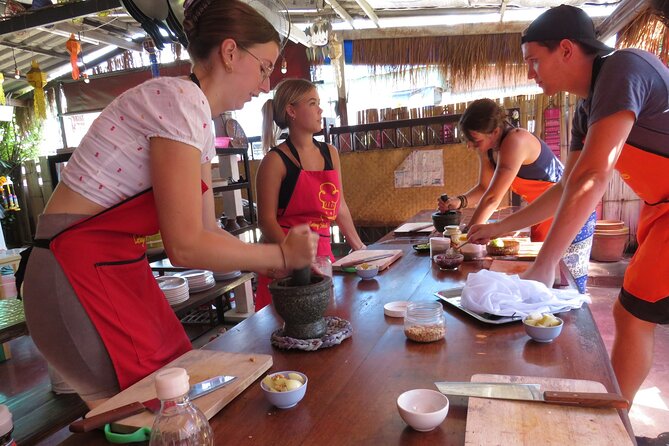 Half-Day Thai Cooking Class and Market Tour From Chiang Mai - Eating the meal you prepared