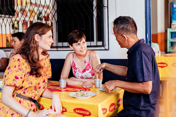 The 10 Tastings of Chiang Mai With Locals: Private Street Food Tour - Wat Mo Kham Tuang adds a quiet pause