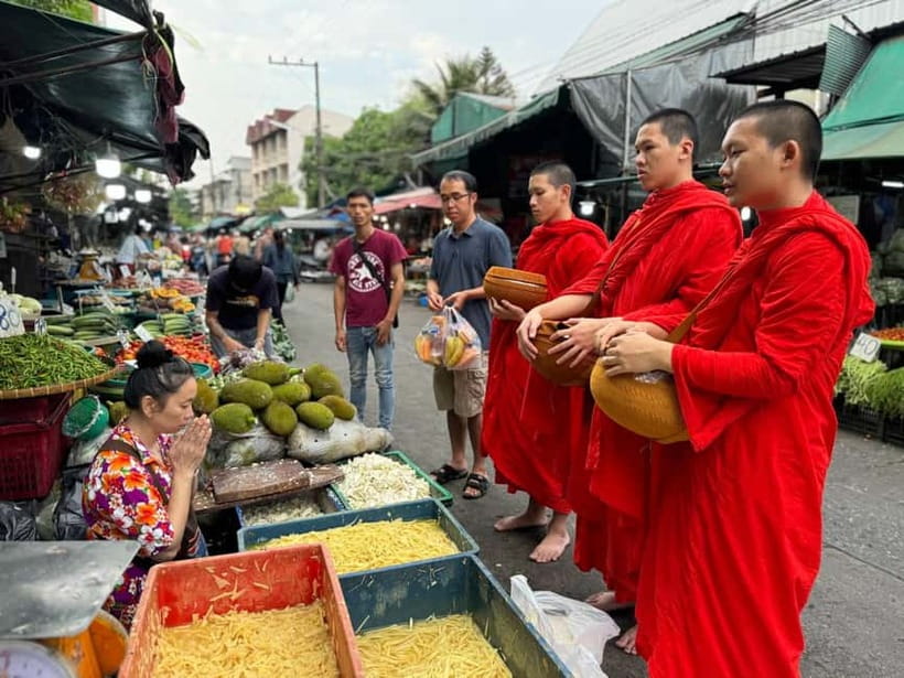 Walk With Monks Collecting Alms(meeting point maybe change) - Mueang Mai Market after sunrise