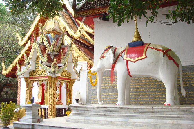 Wat Phra That Doi Suthep & Hmong Village Half Day Tour From Chiang Mai - The short hike to Wat Phra That Doi Suthep