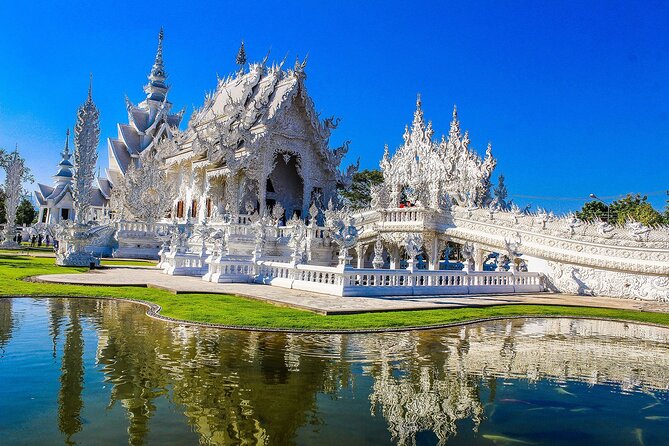 White, Red/Black and Blue Temples Full Day Trip From Chiang Mai - Wat Rong Seur Ten: the intense color of the Blue Temple